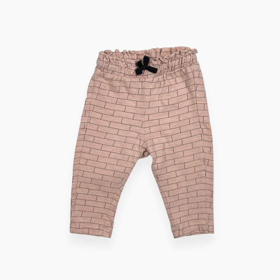 Pantalon rose pâle en coton à imprimé brique 4-6M