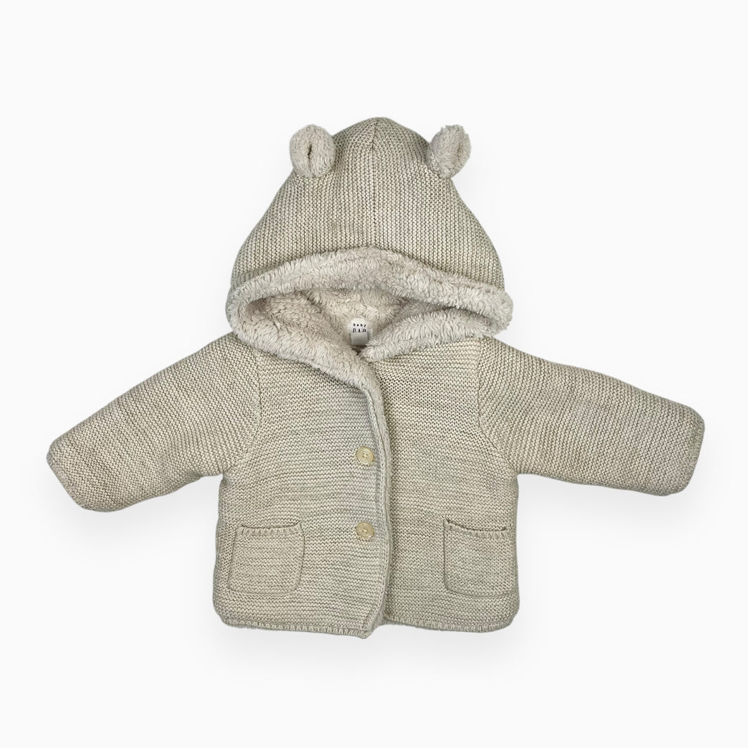 Veste crème à capuchon en tricot scintillant doré et doublée en peluche 3-6M