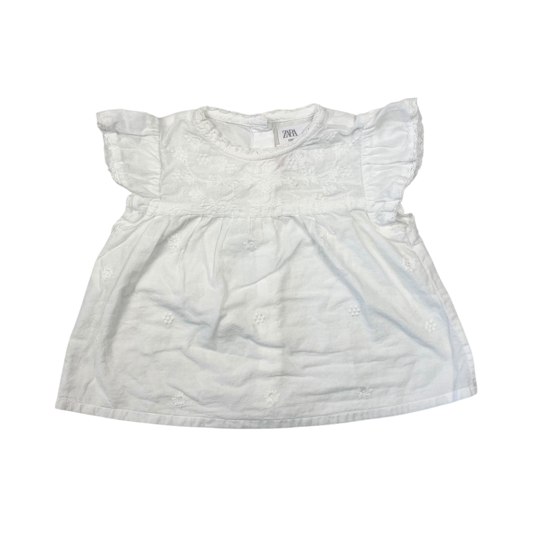 Blouse blanche en coton avec broderies 6-9M